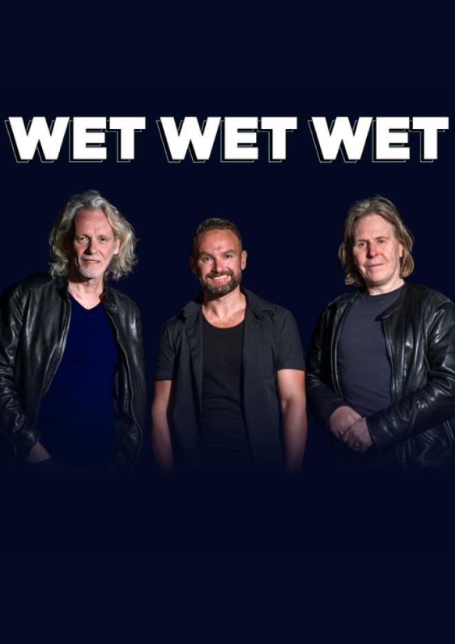 Group Wet Wet Wet stands in front of a dark blue background